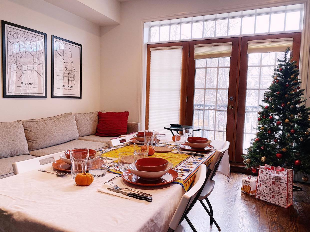 A dining room decorated for a holiday dinner